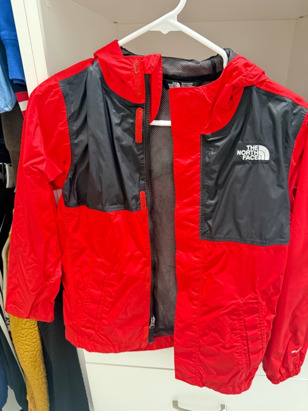The North Face Kids Red and Black Hooded Rain Jacket